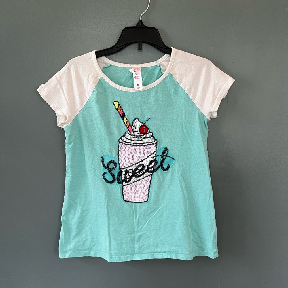 Justice, girls 12 short sleeve shirt, “sweet” sequins with a milkshake 🥛, blue